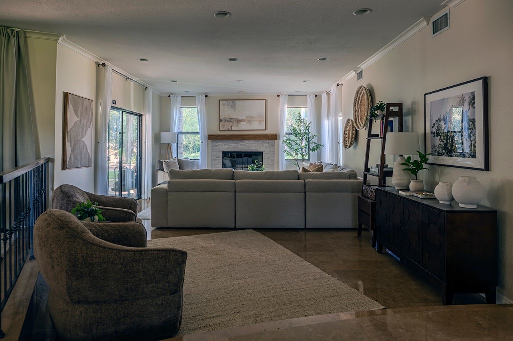 Living room with sectional sofa and fireplace
